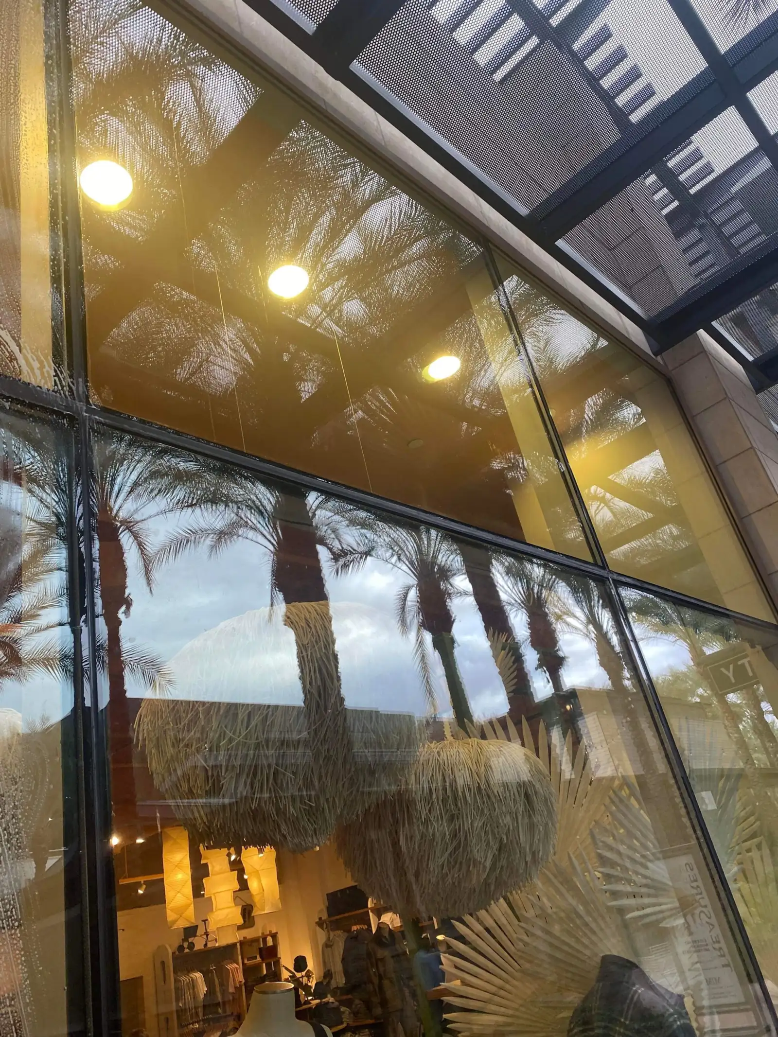 Angled commercial curtain wall glazing after professional window cleaning